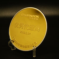 上海韓泰輪胎代理商大會銀鑲金獎?wù)耞 獎?wù)轮谱?紀念章制作 金銀幣定制 獎牌定制 會議表彰 員工福利