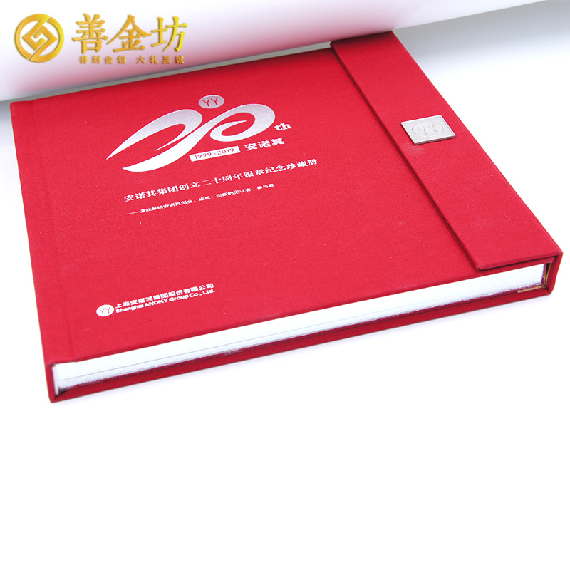 上海安諾其20周年慶典定制銀質(zhì)紀念章珍藏冊